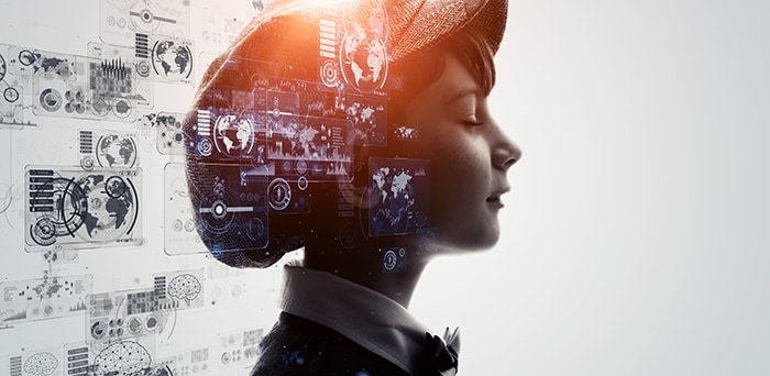 illustration of woman's head looking upwards with a transparent image of a hand putting a semiconductor into place on a circuitboard