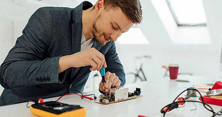 Engineer testing an electrical current